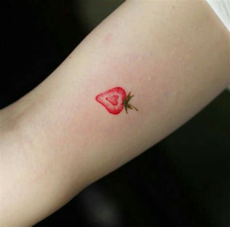 strawberry tattoo|minimalist strawberry tattoo.